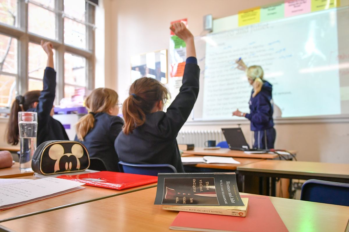 A stock image of school children in a classroom