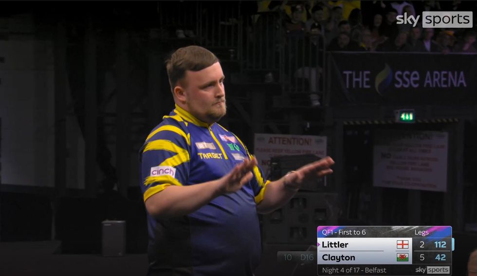 A stony-faced Luke Littler told the Belfast crowd to calm down after a 112-checkout