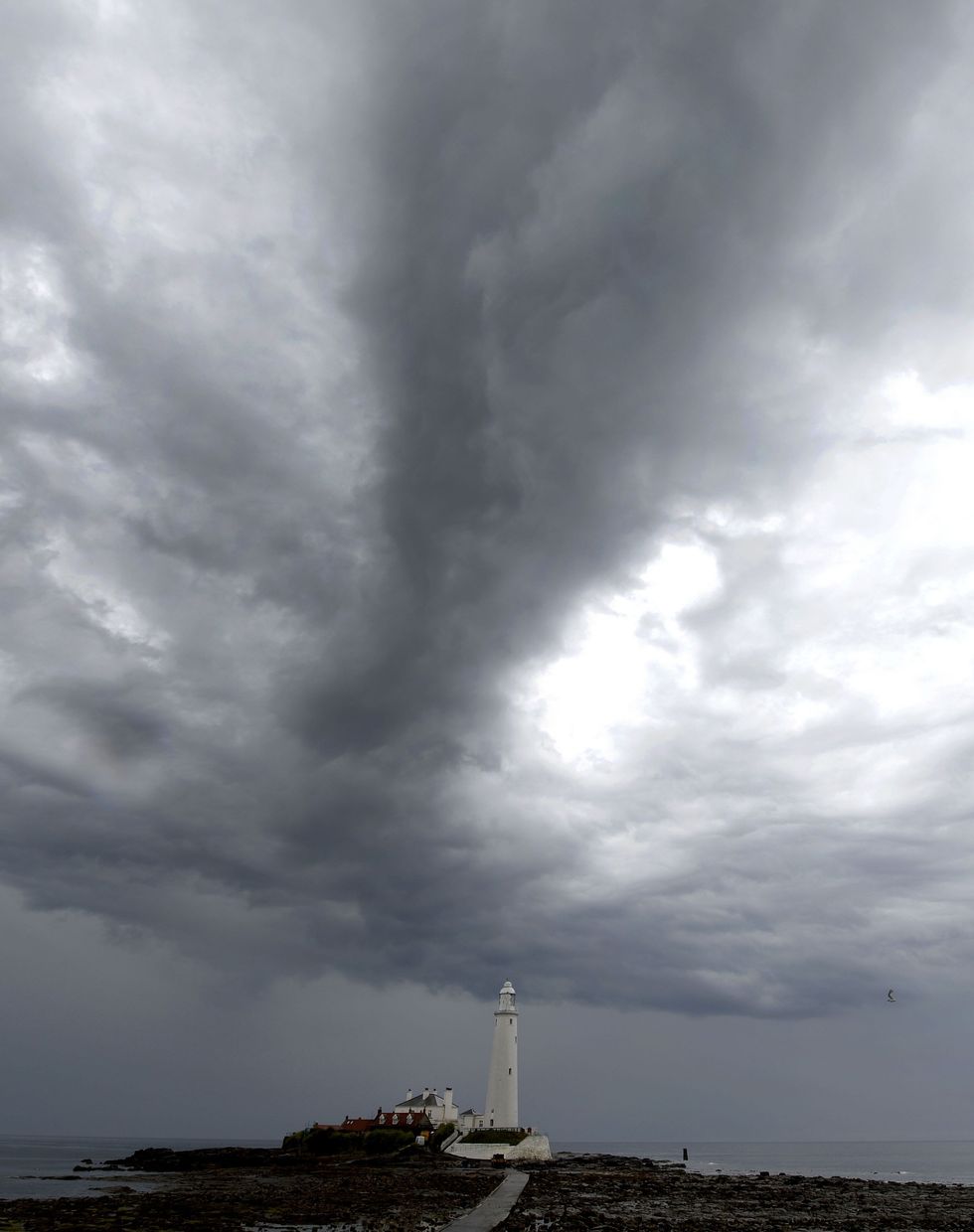 A storm over St Mary's Lighthouse in Northumberland during a previous thunderstorm
