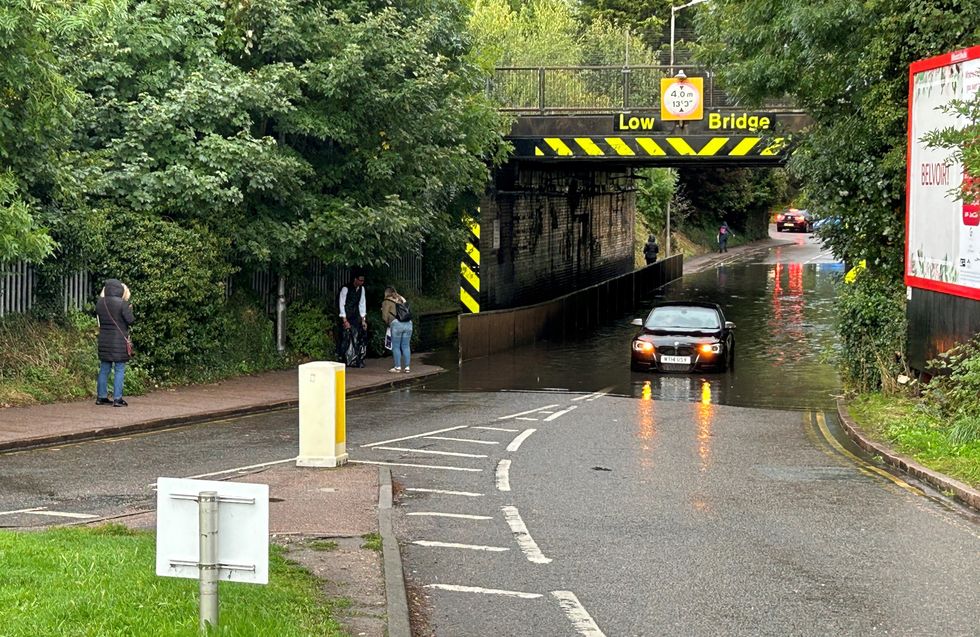 A stranded car in flood water on Cambridge Road, Hitchin\u200b