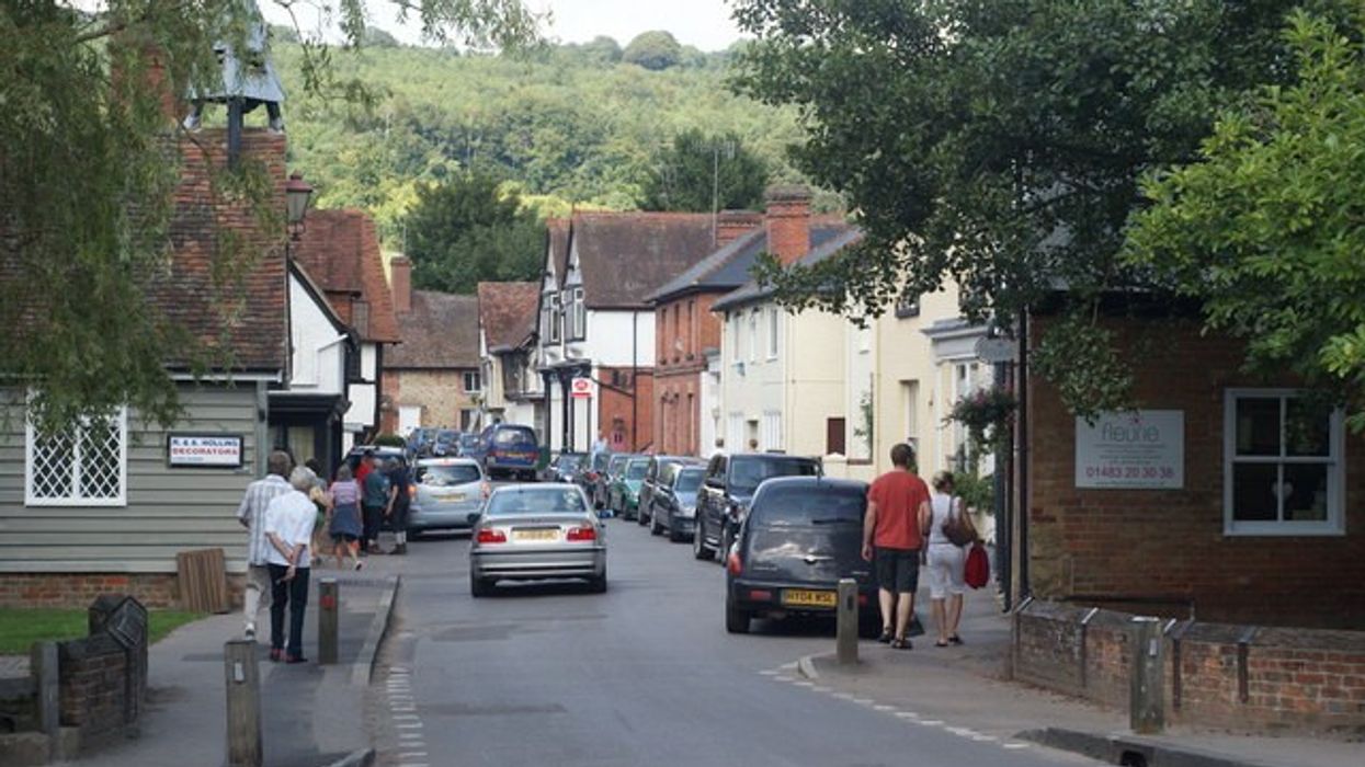 A street with parked cars