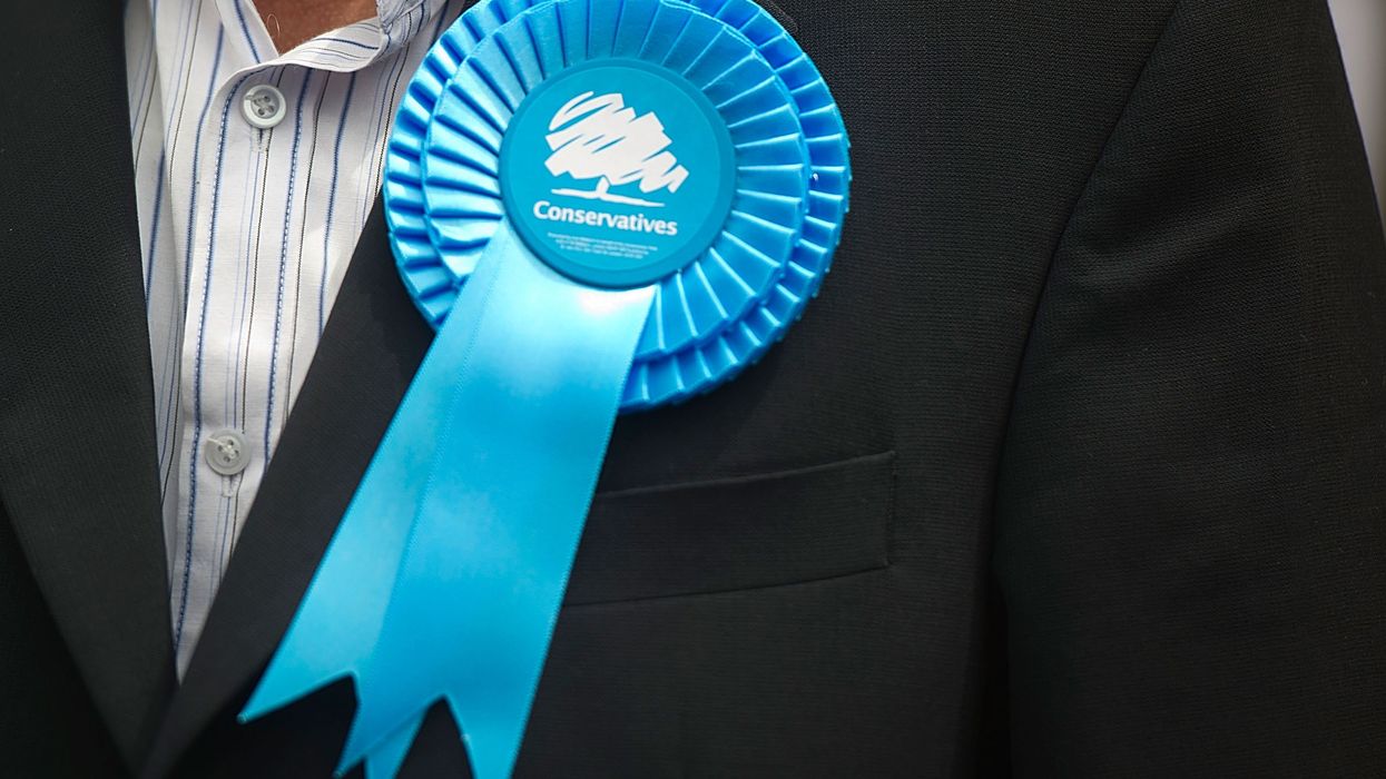 A supporter's Conservative rosette