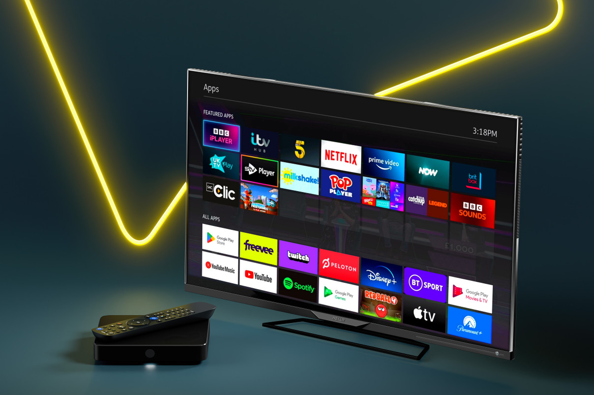 a talktalk tv hub is pictured with the remote laying on top in front of a flatscreen tv running the latest version of the talktalk tv software 