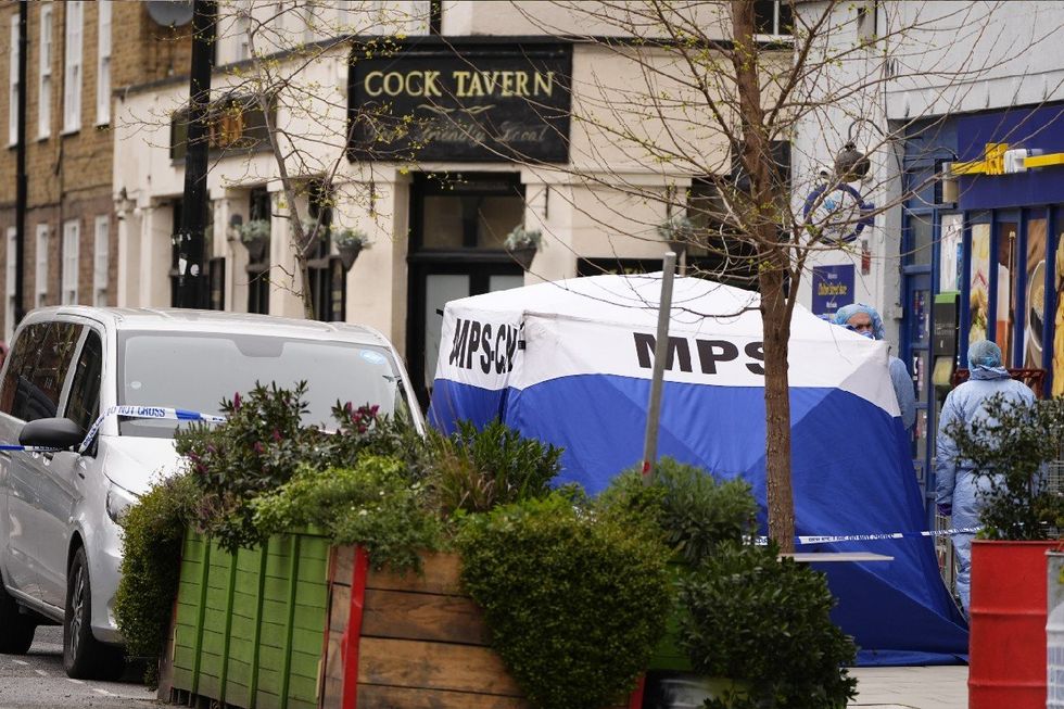 A tent has been erected at the scene of the shooting