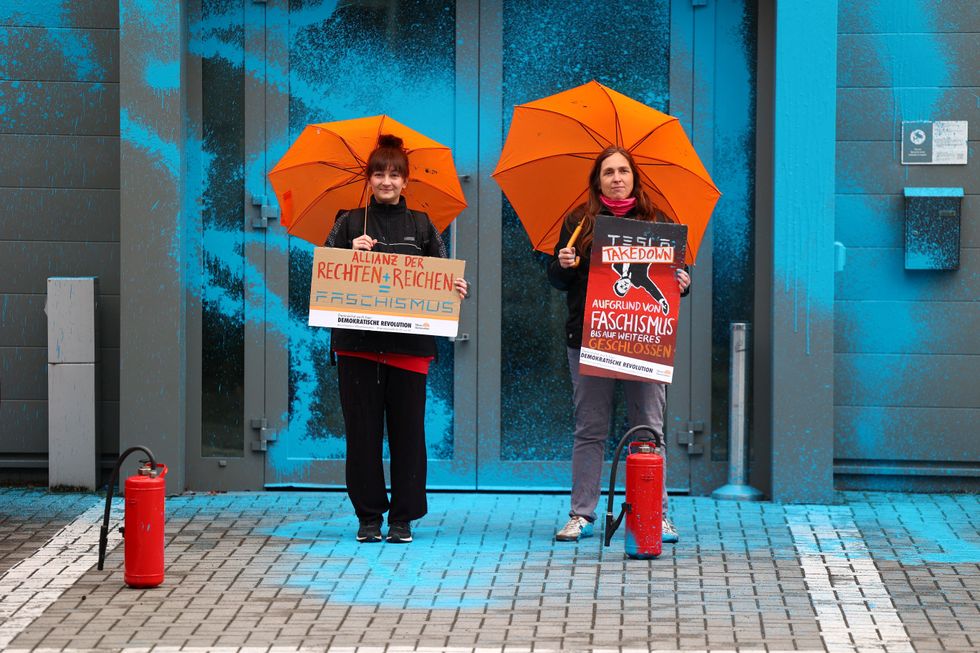 A Tesla Takedown protest outside a dealership in Berlin
