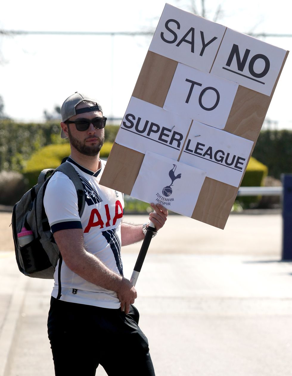 A Tottenham Hotspur fan protests against the European Super League in 2021.