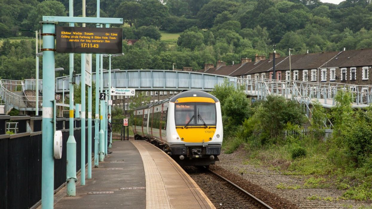 Train crashes into tractor on level crossing as emergency services rush in to treat injuries