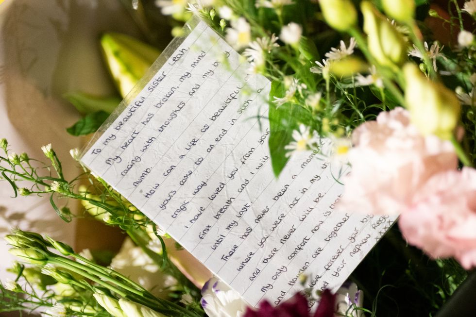 A tribute outside a property in Loxbeare Drive, Furzton, Milton Keynes, where police have identified human remains during forensic examinations in the search for missing teenager Leah Croucher who disappeared while walking to work in February 2019. Officers from Thames Valley Police began searching the house after a tip-off from a member of the public on Monday, and launched a murder inquiry when they found a rucksack and other personal belongings of Ms Croucher's. Picture date: Thursday October 13, 2022.