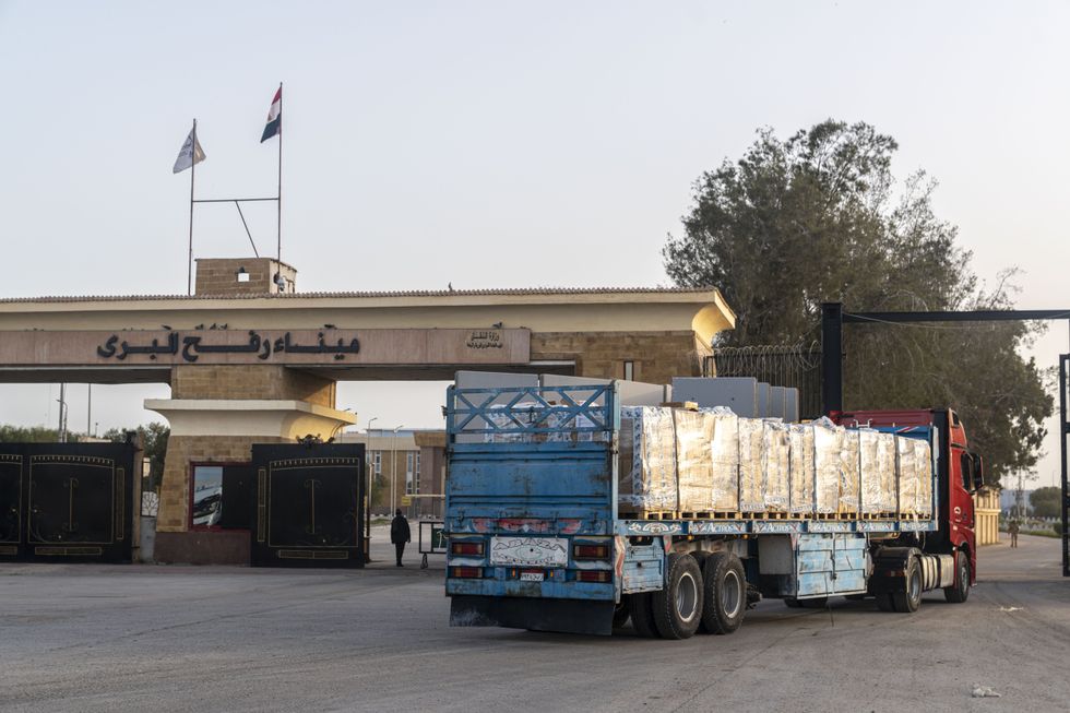 A truck carrying aid enters Gaza through the border crossing