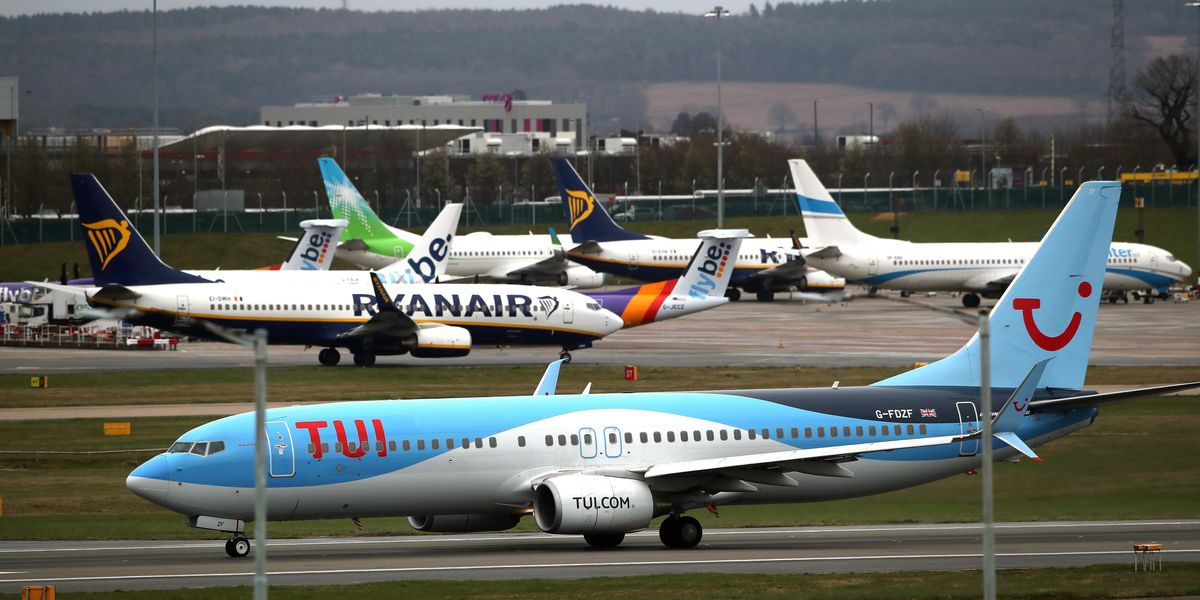 NextImg:Tui flight erupts into chaos as 'drunk' passenger hauled off after screaming that the 'plane is going to crash' and PUNCHING cabin crew
