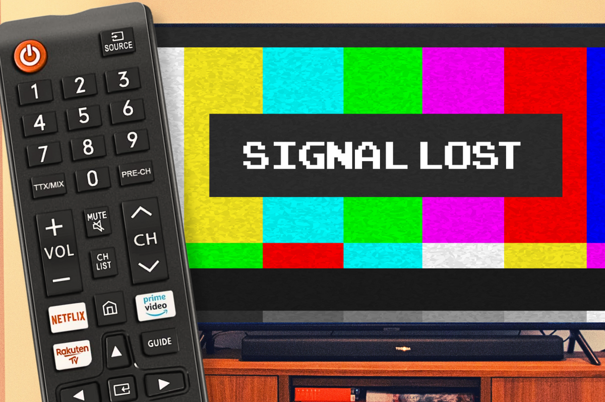 a tv remote is pictured on the left side of the image with a flatscreen television showing a signal lost warning sign in the background 