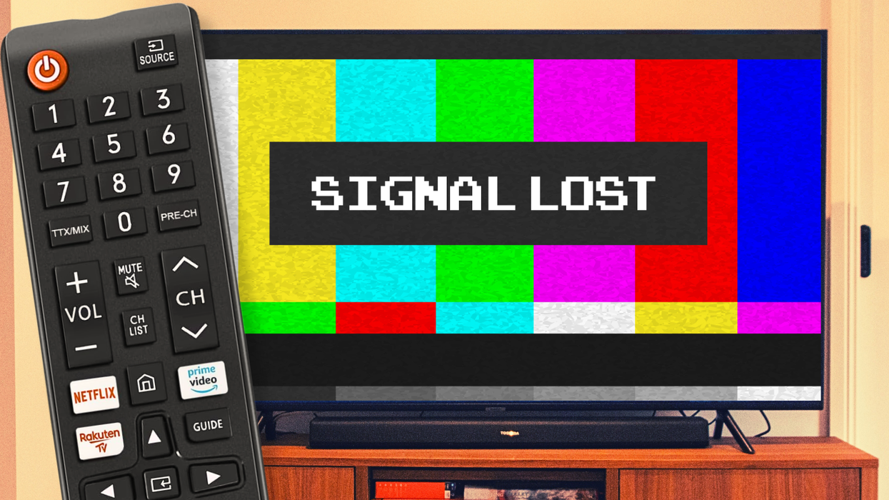 a tv remote is pictured on the left side of the image with a flatscreen television showing a signal lost warning sign in the background