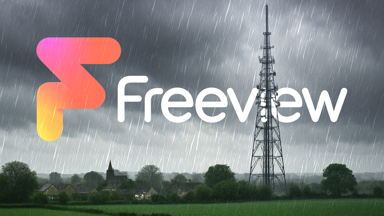 a UK terrestrial television mast pictured with rain clouds and bad weather