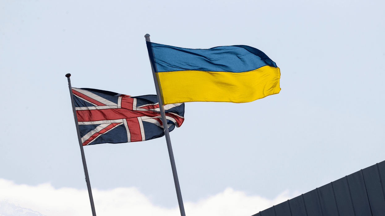 A Ukraine flag and Union Jack flag