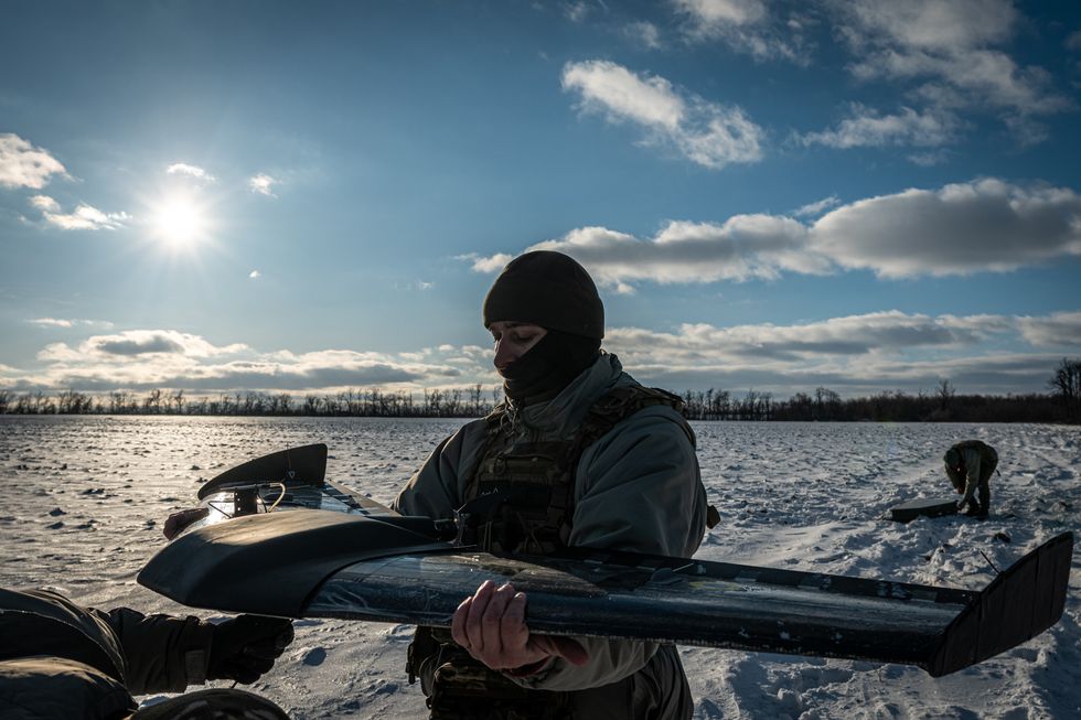 A Ukrainian soldier with a drone near the Bakhmut frontline, in Donetsk Oblast