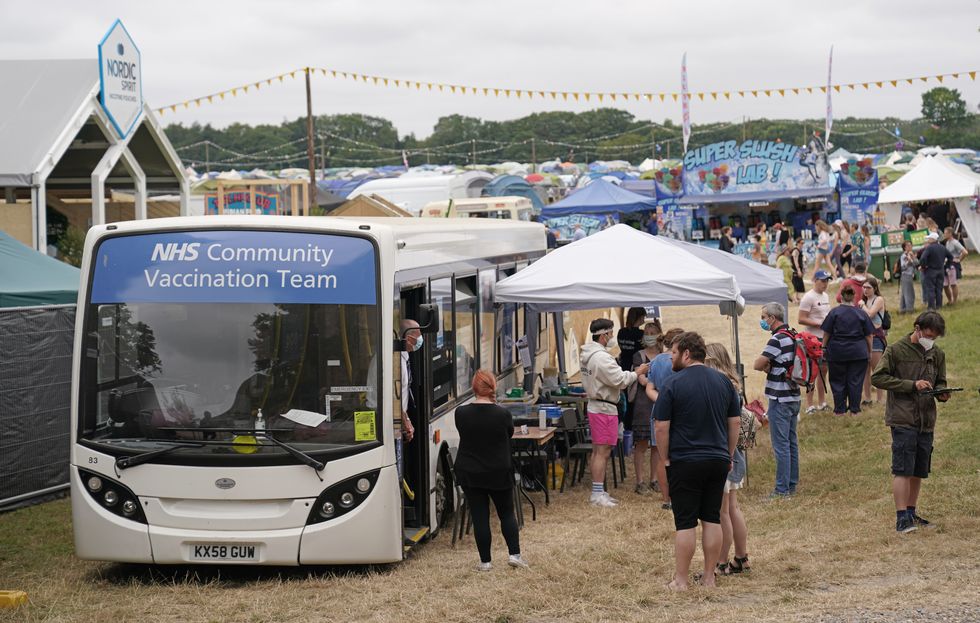 A vaccination bus is set up at the Latitude festival in Henham Park, Southwold, Suffolk. Picture date: Friday July 23, 2021.