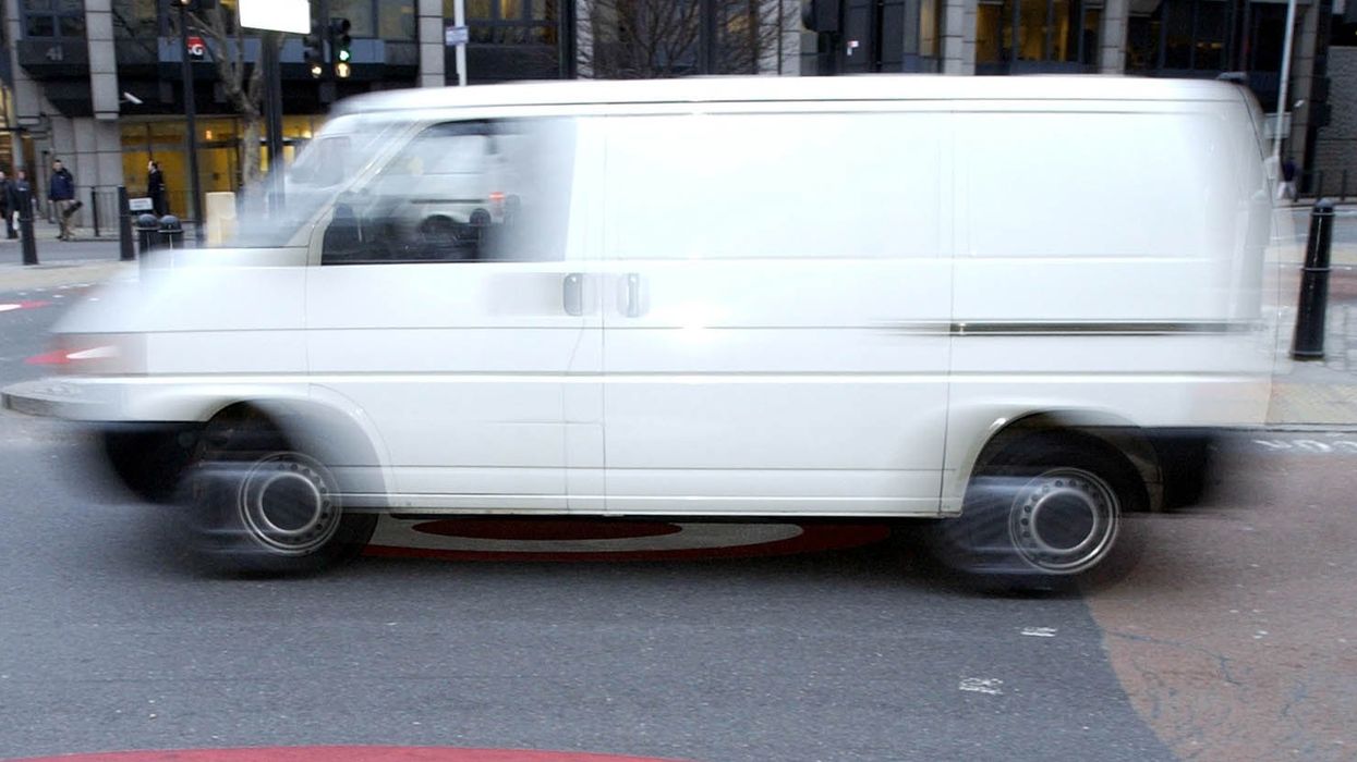 A van passes through the start of the Congestion Charge Zone