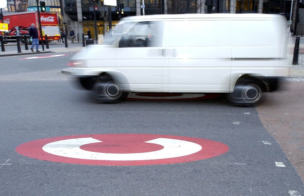A van passes through the start of the Congestion Charge Zone
