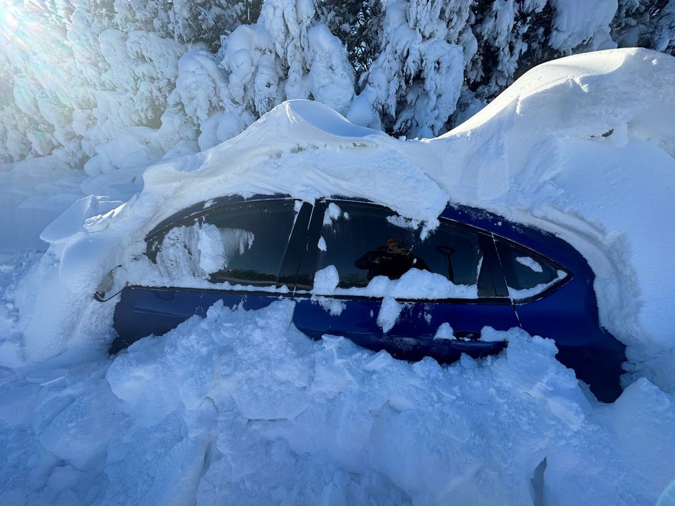 A view of a car covered in snow after heavy snowfall in Regent, North Dakota, U.S. December 23, 2022, in this picture obtained from social media. Blake Rafferty/Twitter@BlakeRafferty1/via REUTERS THIS IMAGE HAS BEEN SUPPLIED BY A THIRD PARTY. MANDATORY CREDIT. NO RESALES. NO ARCHIVES.