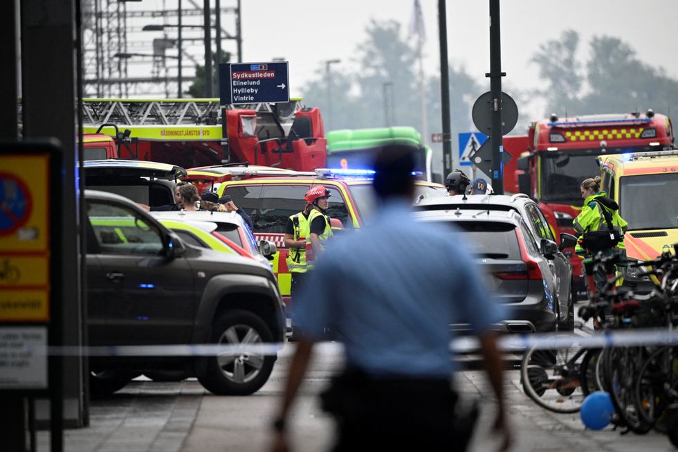 A view of a cordoned off area as emergency personnel work at the scene of a shooting at Emporia Shopping Center in Malmo, Sweden, August 19, 2022. Johan Nilsson/TT News Agency/via REUTERS ATTENTION EDITORS - THIS IMAGE WAS PROVIDED BY A THIRD PARTY. SWEDEN OUT. NO COMMERCIAL OR EDITORIAL SALES IN SWEDEN.
