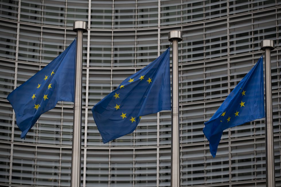 A view of EU flags outside The Berlaymont building, the Headquarters of the European Commission in Brussels.