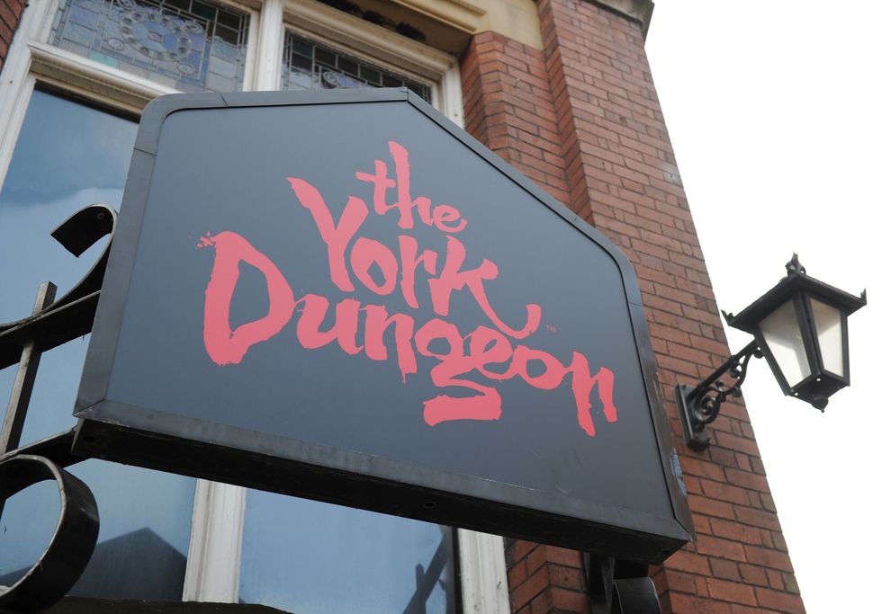 A view of the York Dungeon attraction sign in York.