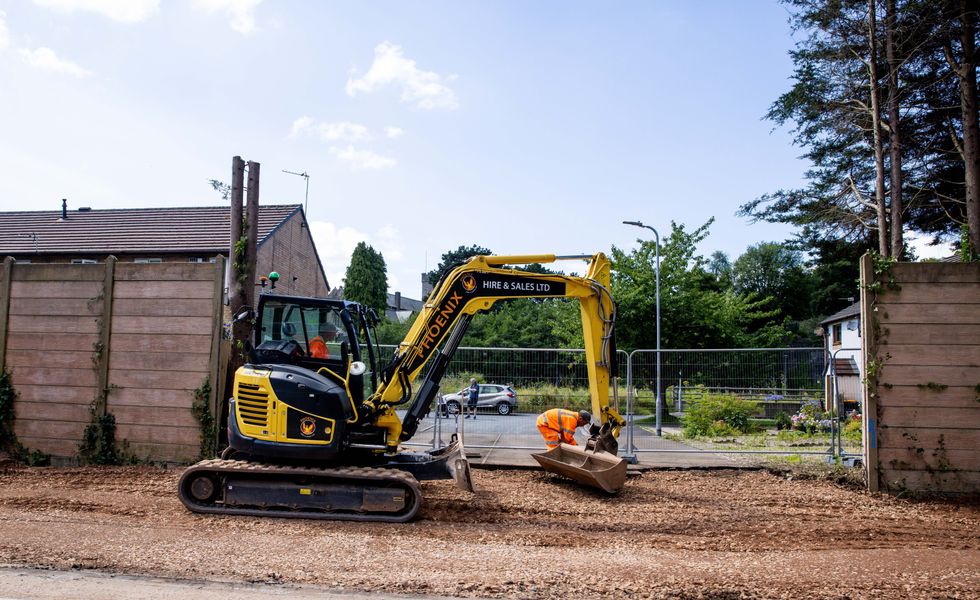 A view of workers constructing emergency vehicular access from Forge Mews onto the A467 on August 10, 2021 in Bassaleg