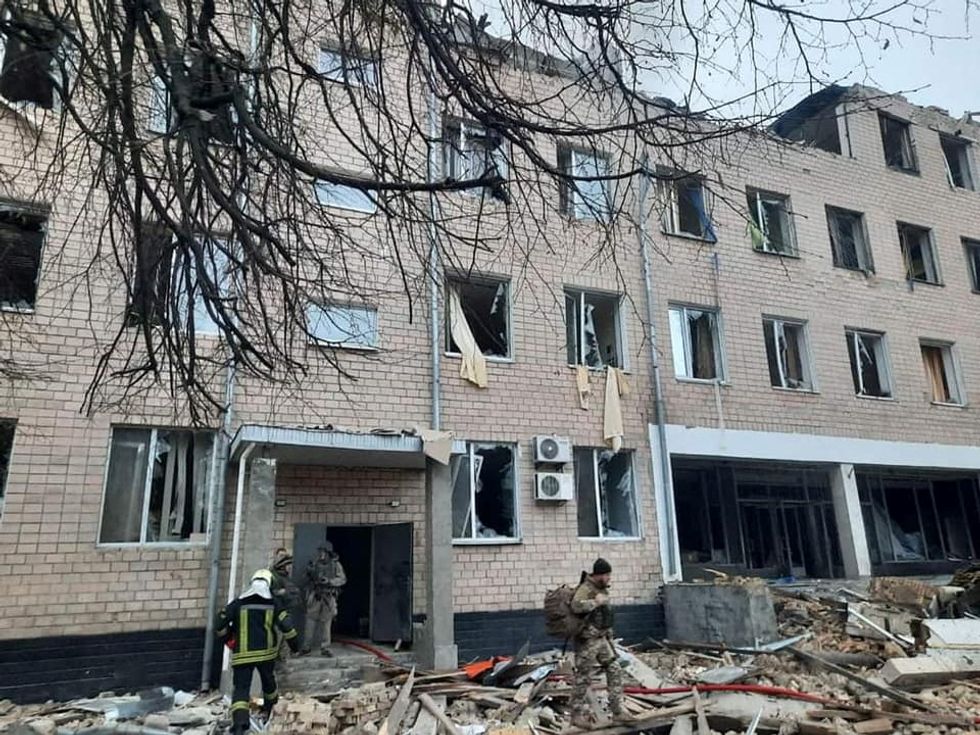 A view shows a building of a military base, which, according to the State Emergency Service of Ukraine, was damaged by fire, after Russian President Vladimir Putin authorized a military operation in eastern Ukraine, in the town of Brovary, near Kyiv, Ukraine, in this handout picture released February 24, 2022. Press Service of the State Emergency Service of Ukraine/Handout via REUTERS ATTENTION EDITORS - THIS IMAGE HAS BEEN SUPPLIED BY A THIRD PARTY.