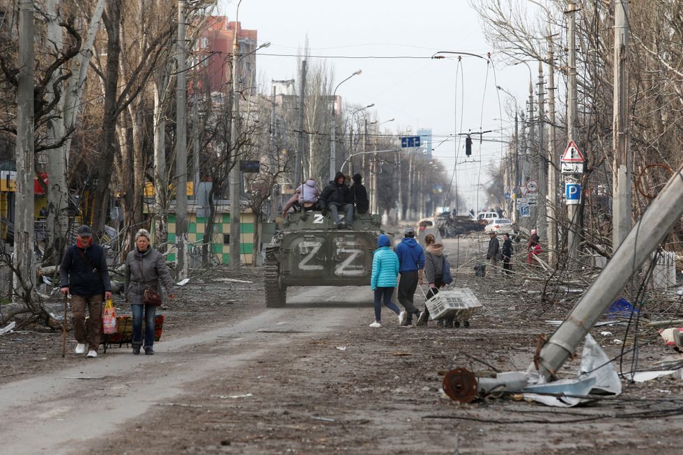 A view shows a street, which was damaged during Ukraine-Russia conflict in the southern port city of Mariupol, Ukraine April 17, 2022. REUTERS/Alexander Ermochenko