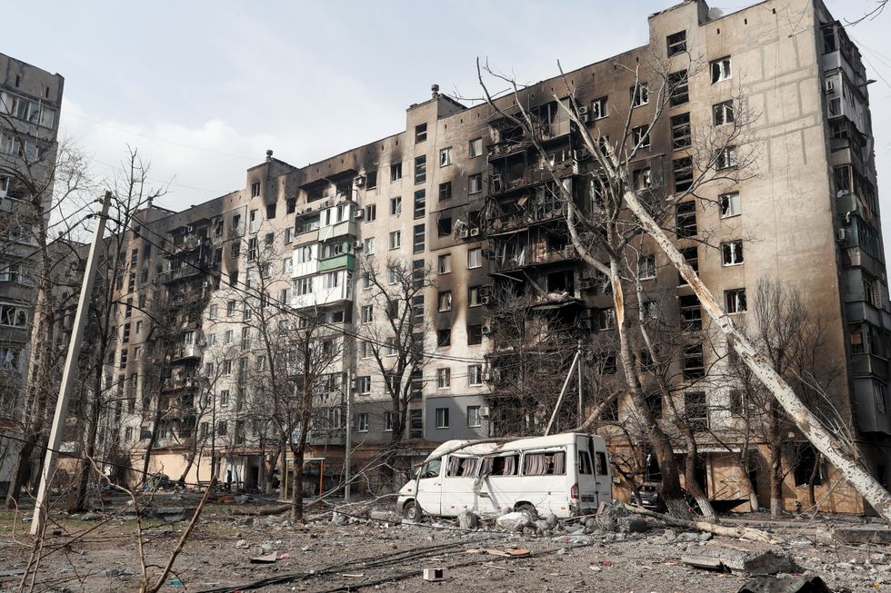 A view shows an apartment building destroyed in the course of Ukraine-Russia conflict in the besieged southern port city of Mariupol, Ukraine March 25, 2022. REUTERS/Alexander Ermochenko