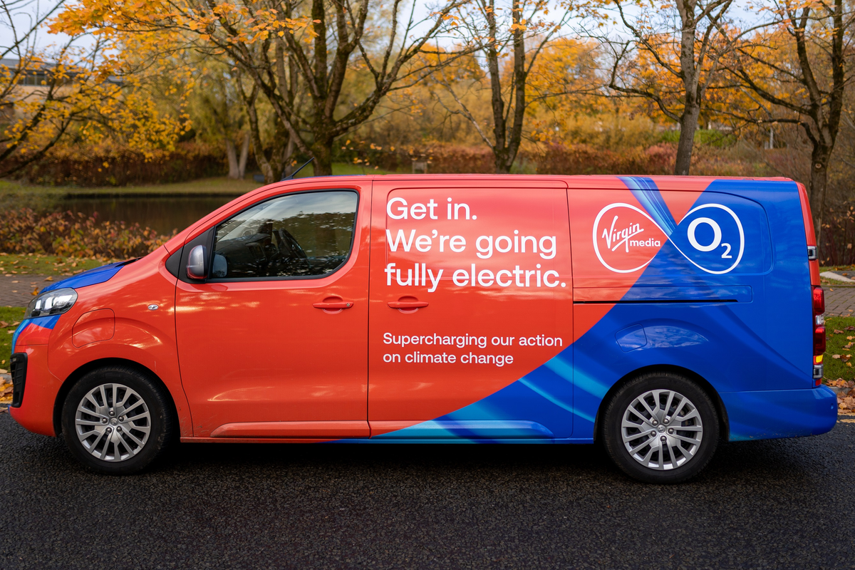 a virgin media o2 van is pictured parked on the side of the street in autumn 