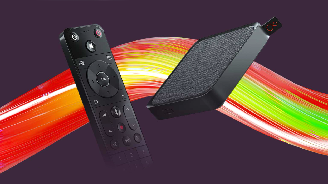 a virgin media stream box with a remote control beside it