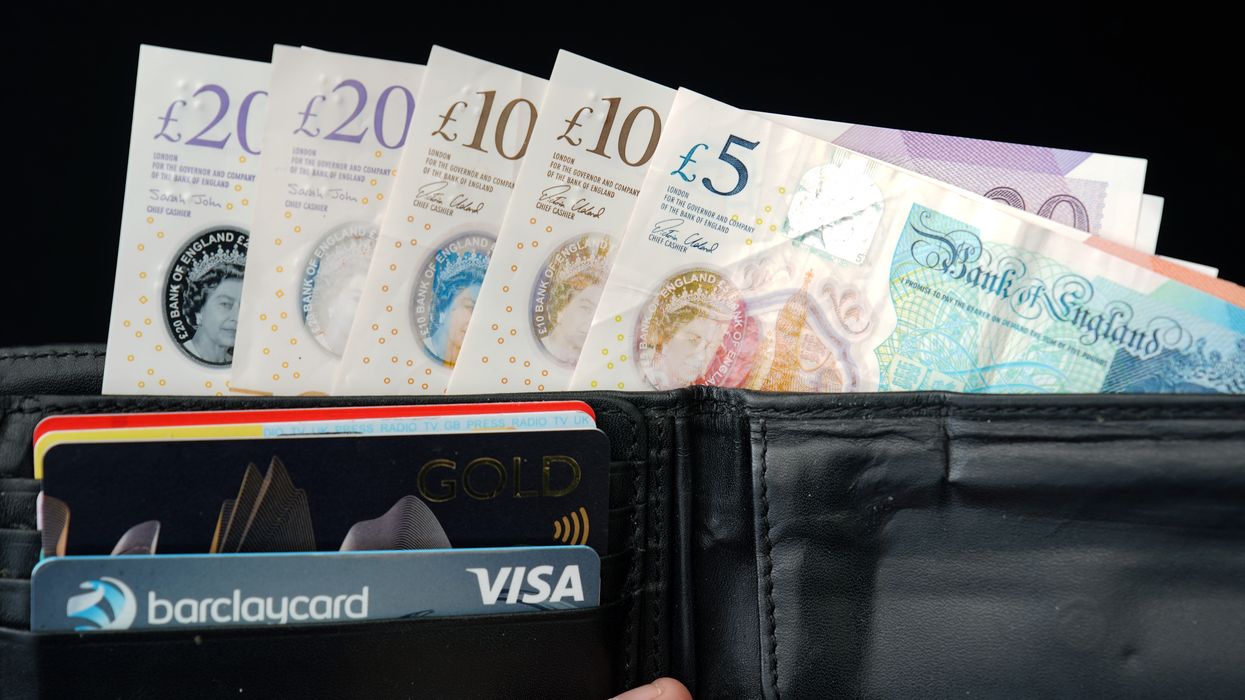 A wallet with both cash and bank cards