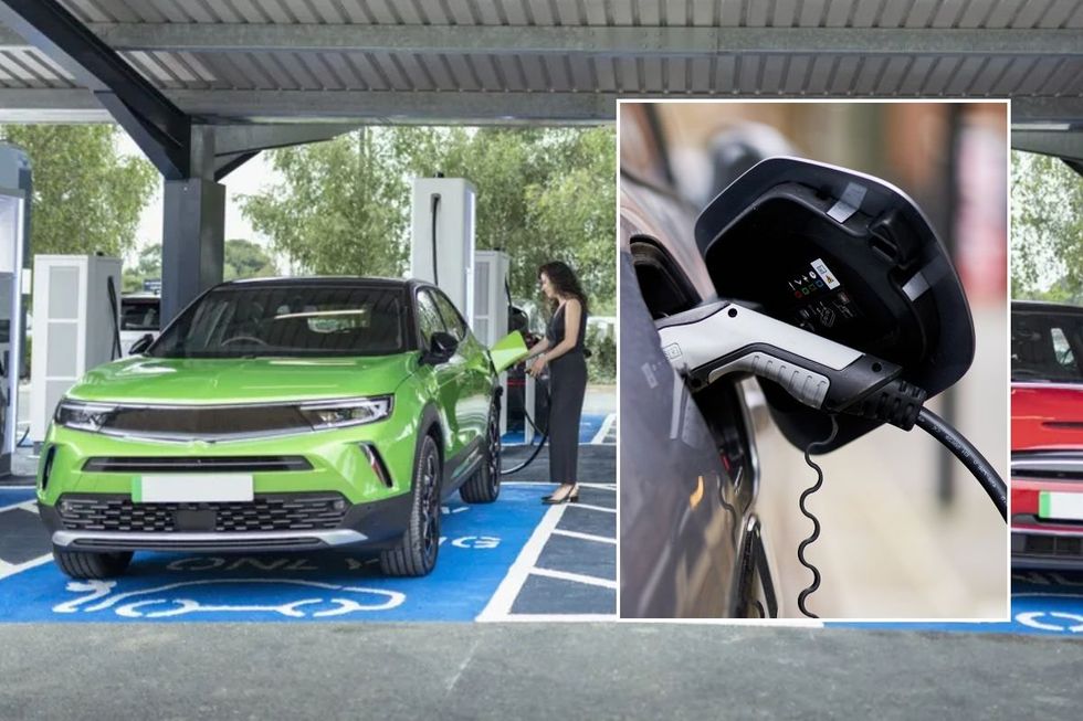 A woman charging an electric car and an EV charger