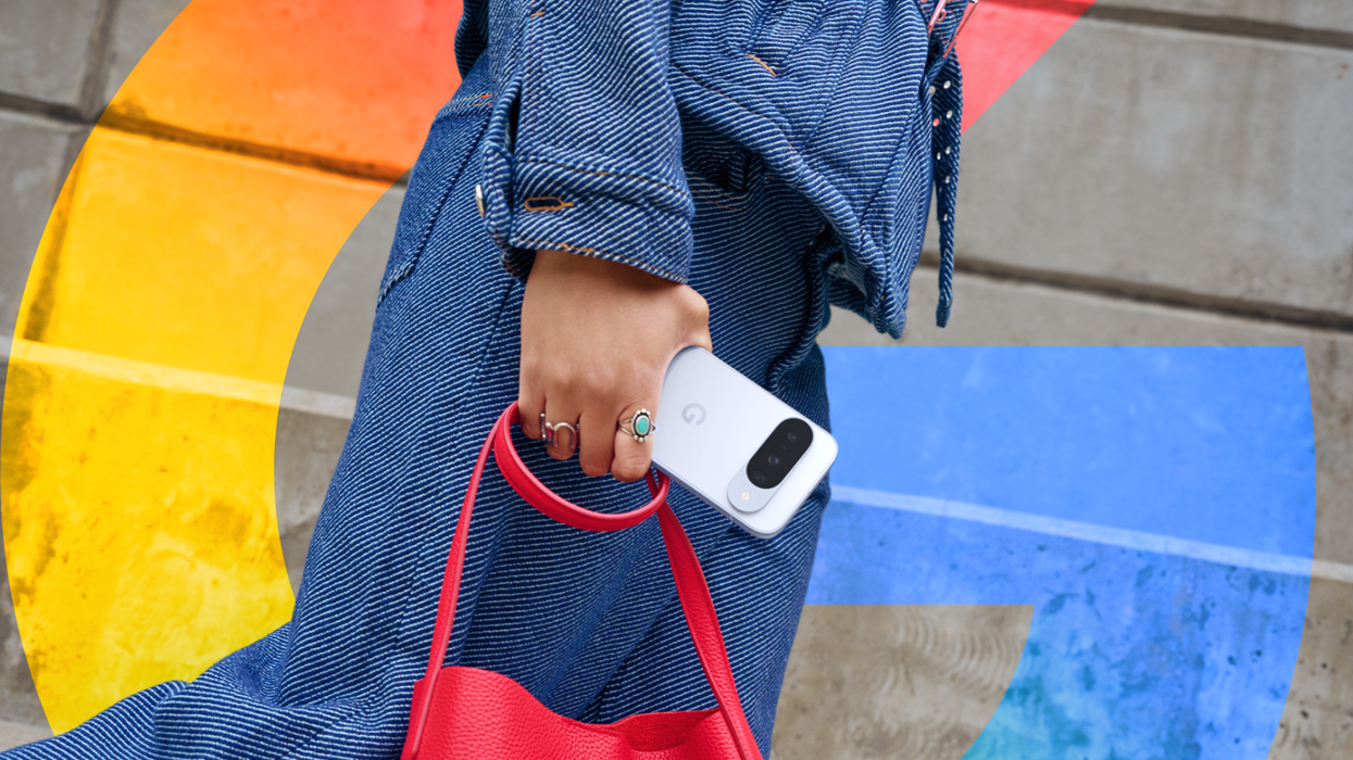 a woman holds the google pixel 10 in her hand with the google logo in the background