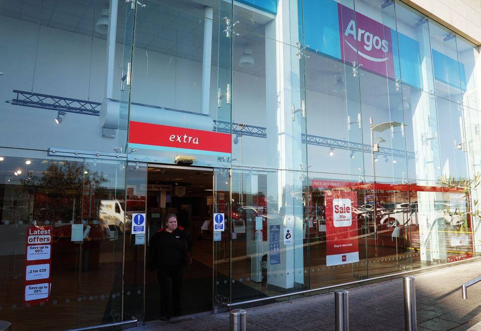 A woman leaves an Argos store in Santry, Dublin