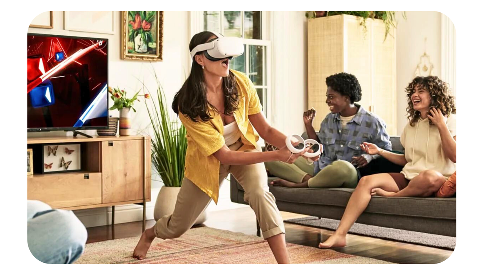 a woman trying out the meta quest 2 vr headset while children laugh