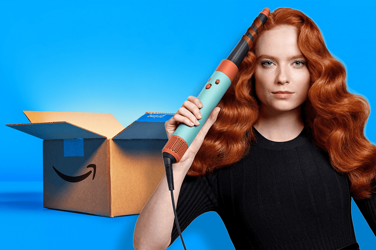 a woman uses the dyson airwrap i.d. to style her hair