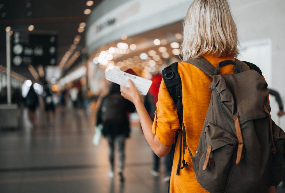 A young traveller at an airport