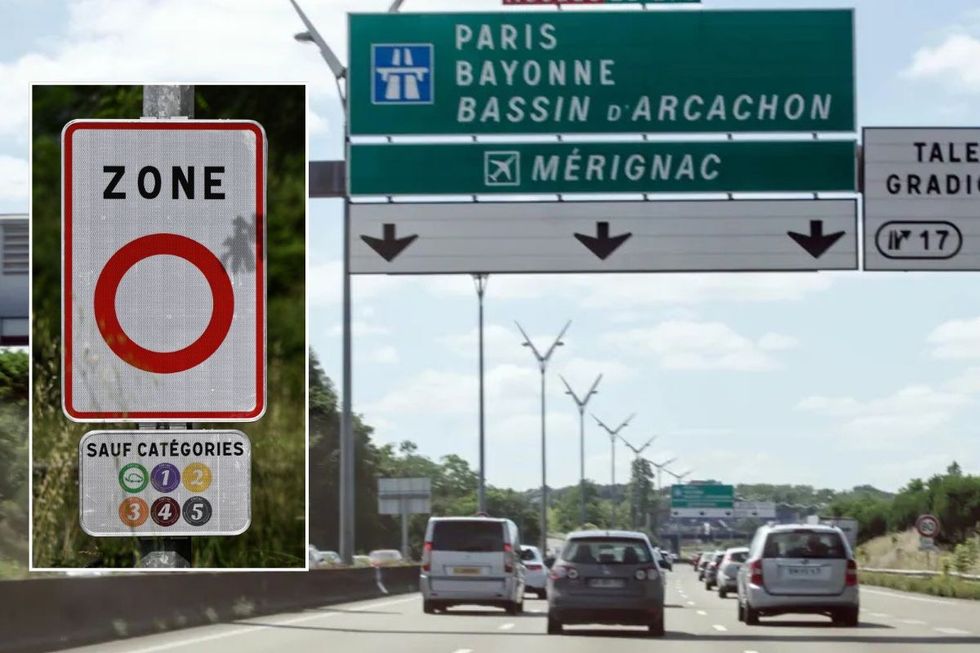 A ZFE sign and cars driving in France