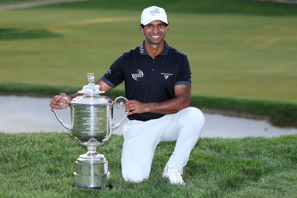 Aaron Rai poses with his trophy following his PGA Championship win