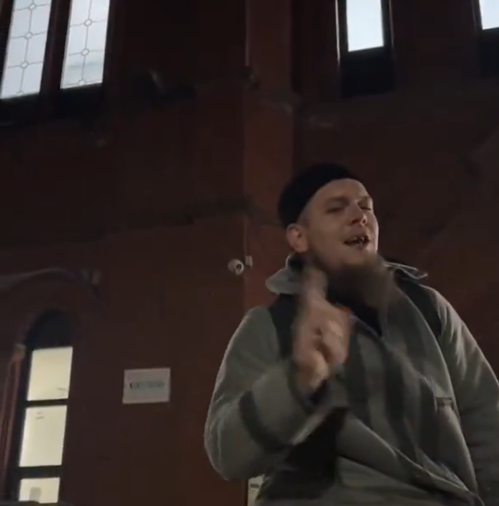 Abdullah Muhammad outside church