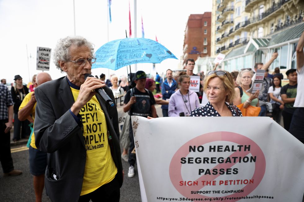 Activist Piers Corbyn leads an anti-vaccine protest outside Britain's Labour Party annual conference venue, in Brighton