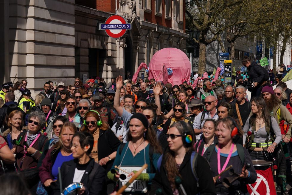 Activists from Extinction Rebellion demonstrate in central London. Picture date: Monday April 11, 2022.