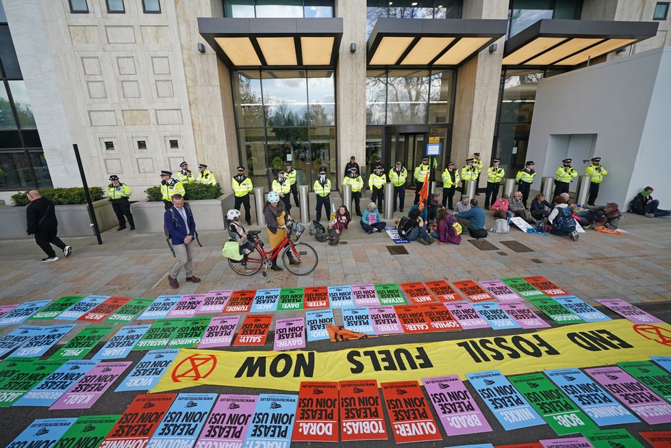 Activists from Extinction Rebellion demonstrate outside the Shell building on the Southbank in London