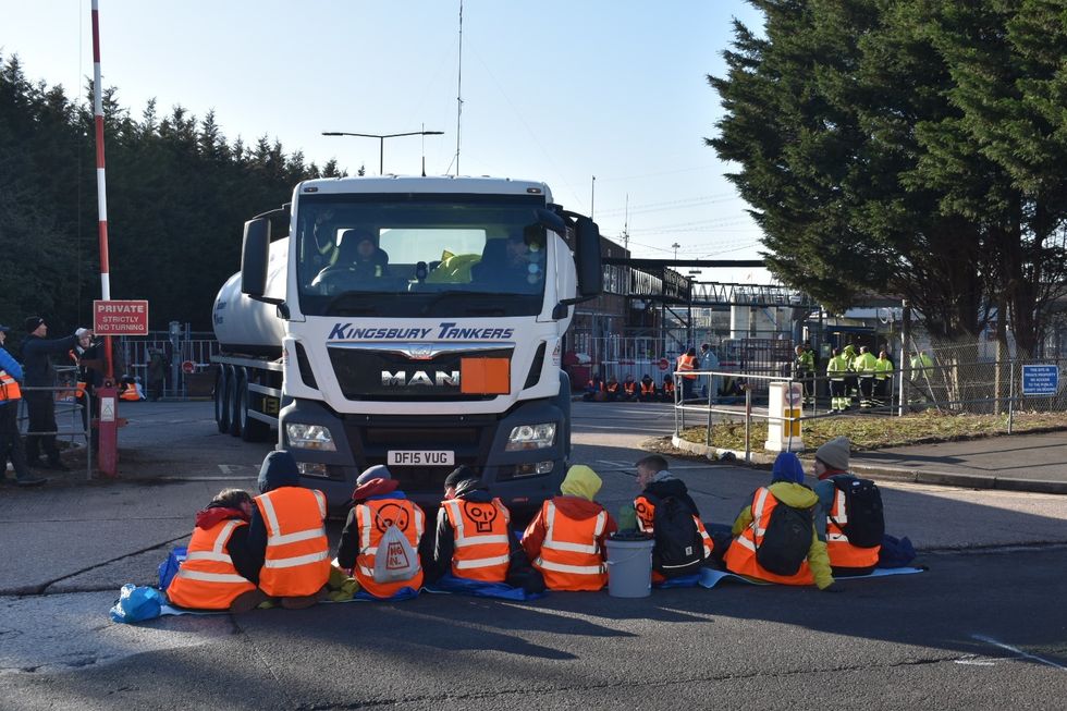 Activists from Just Stop Oil during one of their blockades at the Esso depot in Wood Lane, Birmingham early on Friday. Picture date: Friday April 1, 2022.