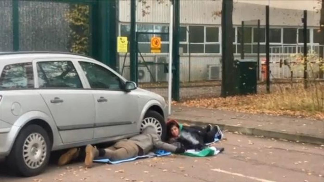 Palestine protesters 'lock down' British factory as they set off flares and block entrance