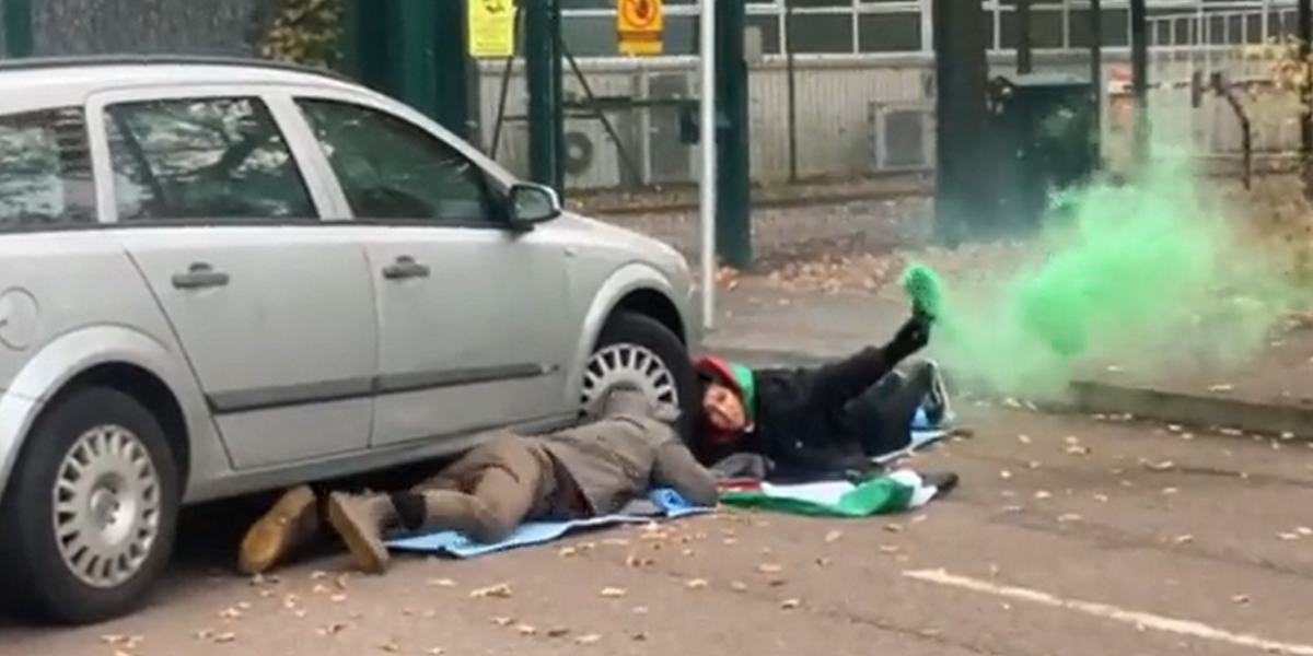 NextImg:Palestine protesters 'lock down' British factory as they set off flares and block entrance