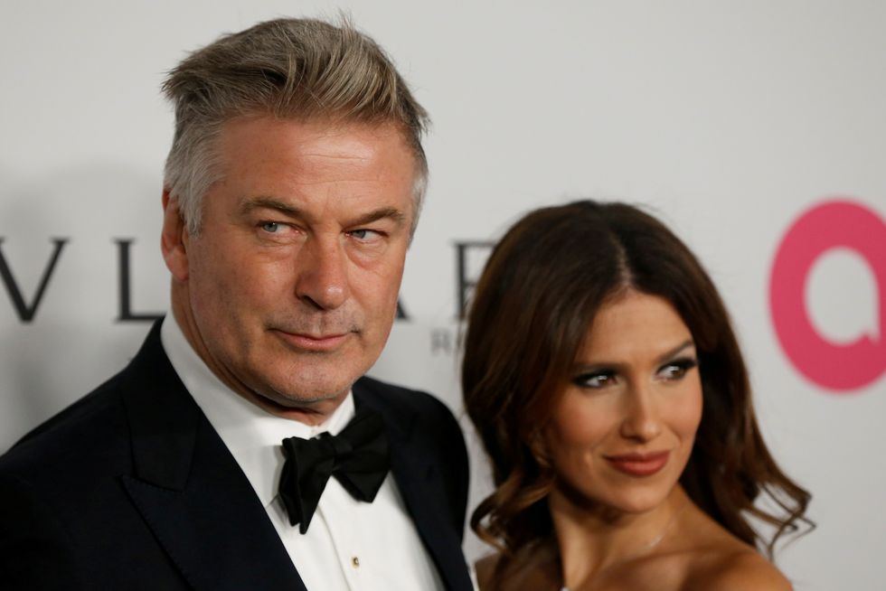 Actor Alec Baldwin and his wife Hilaria Baldwin pose on the red carpet during the commemoration of the Elton John AIDS Foundation 25th year fall gala at the Cathedral of St. John the Divine in New York City