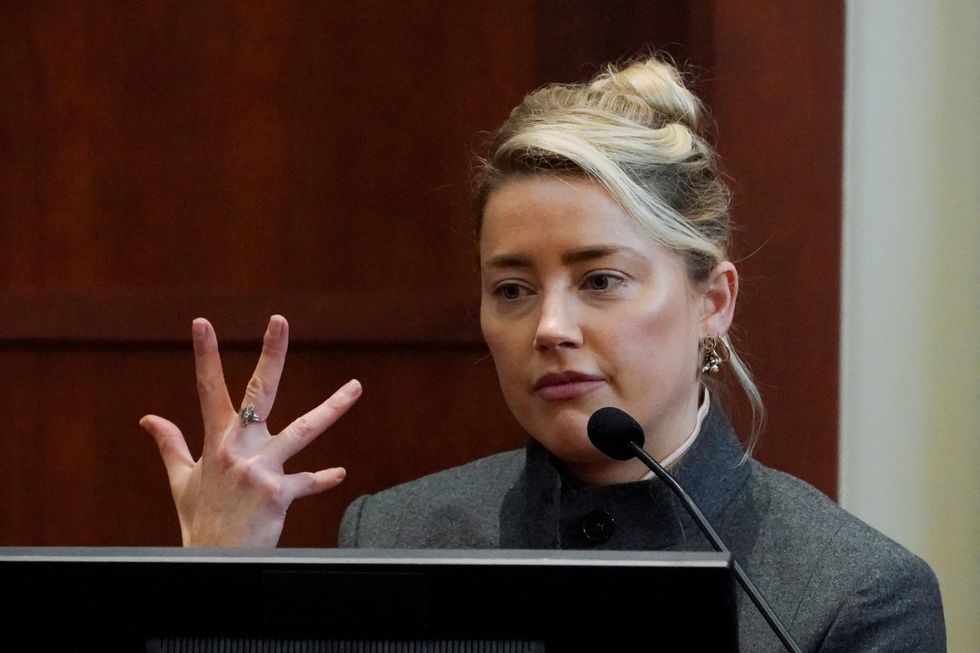 Actor Amber Heard testifies in the courtroom at the Fairfax County Circuit Courthouse in Fairfax, Virginia, U.S., May 16, 2022. Steve Helber/Pool via REUTERS